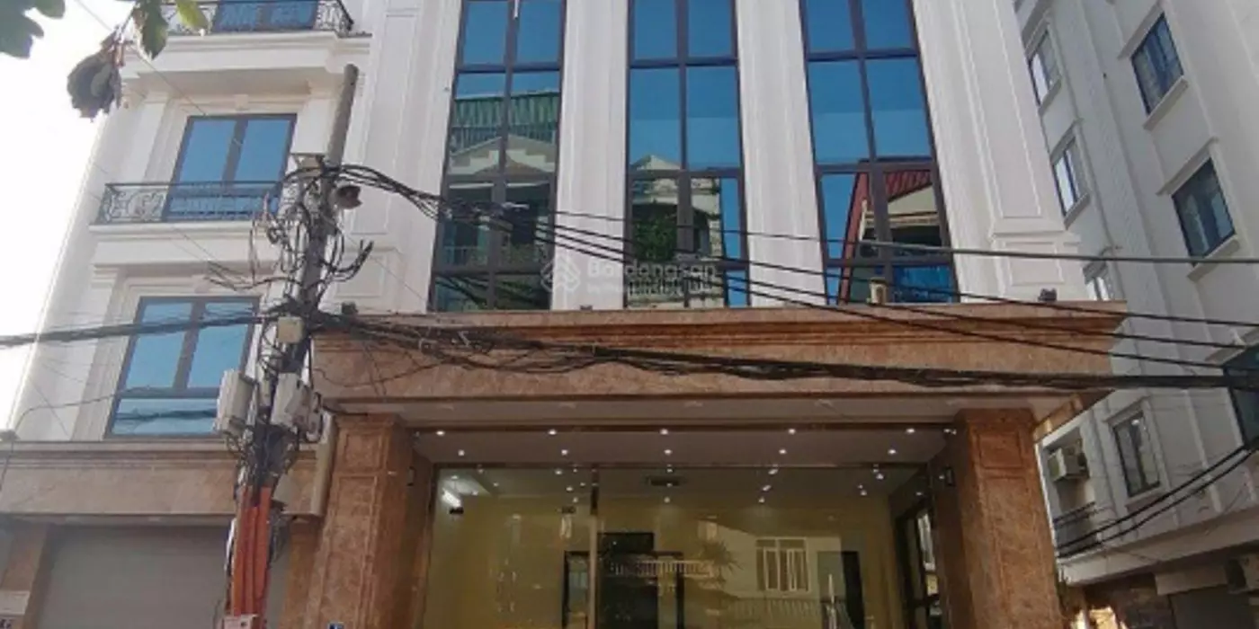 Cho thuê nhà MẶT PHỐ Trần Qúy Cáp .DT : 90 M x 8 Tầng . MT: 7 M.THÔNG SÀN, THANG MÁY.