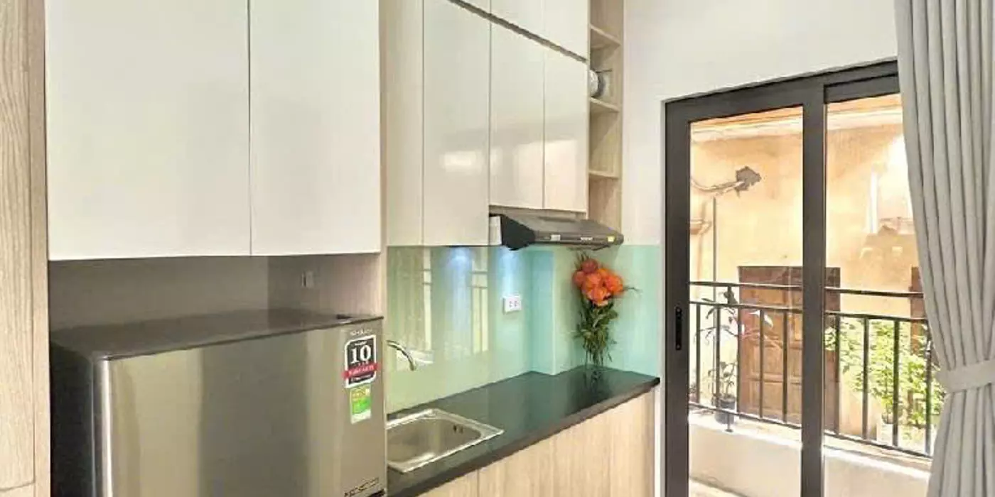 bán nhà dòng tiền tây sơn 8 tầng thang máy long lanh ô tô vào nhà đống đa