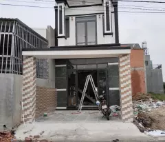 Nhà Lầu trệt SHR 81m2 mặt tiền nhựa 7m sân xe 7 chỗ gần chợ Tân Phước Khánh, Giá chỉ 2,55 tỷ TL