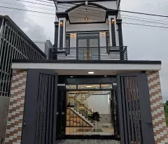Nhà mới SHR 82m2 mặt tiền nhựa 7m sân xe 7 chỗ gần chợ Tân Phước Khánh, Giá chỉ 2,55 tỷ TL