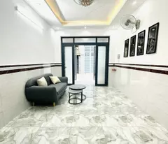 NHÀ 2 TẦNG TK HIỆN ĐẠI MỘT TRỤC ĐƯỜNG THỐNG NHẤT HXH 7M THÔNG.