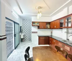 NHÀ 2 TẦNG TK HIỆN ĐẠI MỘT TRỤC ĐƯỜNG THỐNG NHẤT HXH 7M THÔNG.