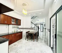 NHÀ 2 TẦNG TK HIỆN ĐẠI MỘT TRỤC ĐƯỜNG THỐNG NHẤT HXH 7M THÔNG.