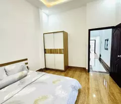 NHÀ 2 TẦNG TK HIỆN ĐẠI MỘT TRỤC ĐƯỜNG THỐNG NHẤT HXH 7M THÔNG.