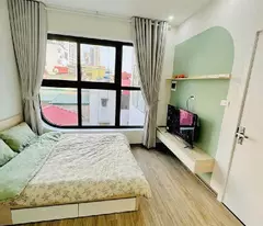 bán nhà dòng tiền tây sơn 8 tầng thang máy long lanh ô tô vào nhà đống đa