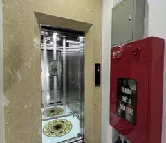 bán nhà dòng tiền tây sơn 8 tầng thang máy long lanh ô tô vào nhà đống đa