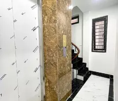 Bán nhà Hoàng Quốc Việt,34m2,6T,Lô góc, nhà mới, thang máy, ngõ thông, oto 10m 7tỷ95