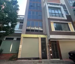 CẦN BÁN GÂP NHÀ MẶT PhỐ - KINH DOANH BẤT CHẤP - TOÀ NHÀ 6 TẦNG - GARA- THANG MÁY. Đàm Quang Trung