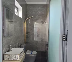 Nhà mới 100% 1 trệt 1 lầu , mái thái,  mặt tiền dx 065 phường Định Hòa tp. Thủ Dầu Một, Bình Dương.