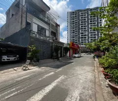 Bán khu đất kdc sổ hồng ,xuất hiện sẵn căn nhà kho trên Q.9, 104m2 , ngang 6.3m