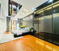 nguyễn văn huyên 48m x6 tầng thang máy 15,8 tỷ gara ô tô,ngõ thông kinh doanh
