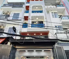 Cần  bán gấp căn nhà 1 trệt 1 lửng 4 lầu - thang máy, gara-  Phan Huy Ích - P.14 Gò Vấp - HCM