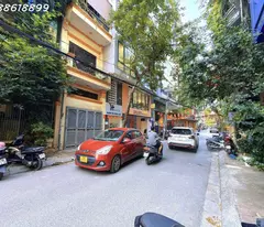 PHÂN LÔ HUỲNH THÚC KHÁNG - ĐỐNG ĐA - 100M² - MẶT TIỀN 8M - THANG MÁY - Ô TÔ TRÁNH - KINH DOANH