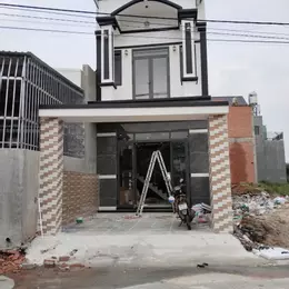Nhà Lầu trệt SHR 81m2 mặt tiền nhựa 7m sân xe 7 chỗ gần chợ Tân Phước Khánh, Giá chỉ 2,55 tỷ TL