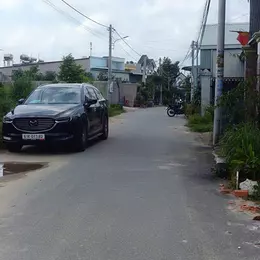Nhà mới SHR 82m2 mặt tiền nhựa 7m sân xe 7 chỗ gần chợ Tân Phước Khánh, Giá chỉ 2,55 tỷ TL