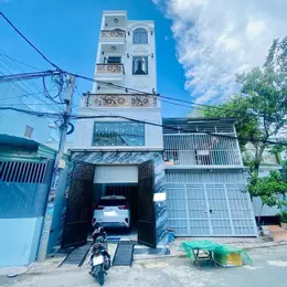 NHÀ 5 TẦNG ĐƯỜNG NHỰA 8M THÔNG - KHU VIP TRUNG MỸ TÂY - XE HƠI NGỦ TRONG NHÀ. giá 6,2 tỷ.