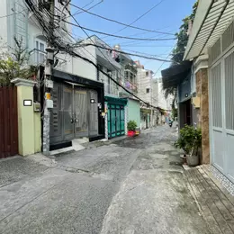 Bán nhà Nơ Trang Long - HXH 7 chỗ -SD 123m2 -Doanh thu 270 triệu/năm