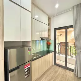 bán nhà dòng tiền tây sơn 8 tầng thang máy long lanh ô tô vào nhà đống đa