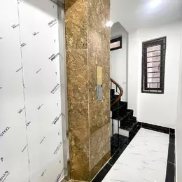 Bán nhà Hoàng Quốc Việt,34m2,6T,Lô góc, nhà mới, thang máy, ngõ thông, oto 10m 7tỷ95