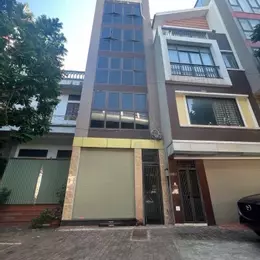 CẦN BÁN GÂP NHÀ MẶT PhỐ - KINH DOANH BẤT CHẤP - TOÀ NHÀ 6 TẦNG - GARA- THANG MÁY. Đàm Quang Trung
