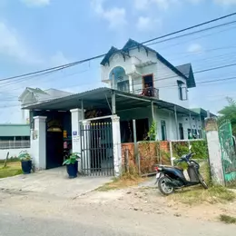 Bán nhà lầu góc 2mt đường nhựa / tỉnh lộ 15, xã Trung An dt 168m2 kèm 3 phòng trọ giá 3,8 tỷ