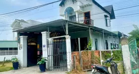 Bán nhà lầu góc 2mt đường nhựa / tỉnh lộ 15, xã Trung An dt 168m2 kèm 3 phòng trọ giá 3,8 tỷ